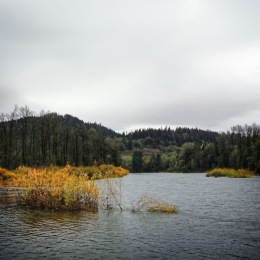 a lake with mountains