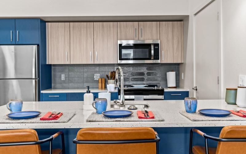 a kitchen with blue plates